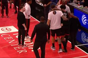 還是好兄弟！伊森受傷 亞當斯將其攙扶離場 兩人此前曾有過沖突